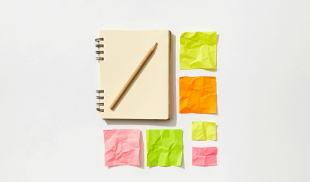 Colorful notes with notebook